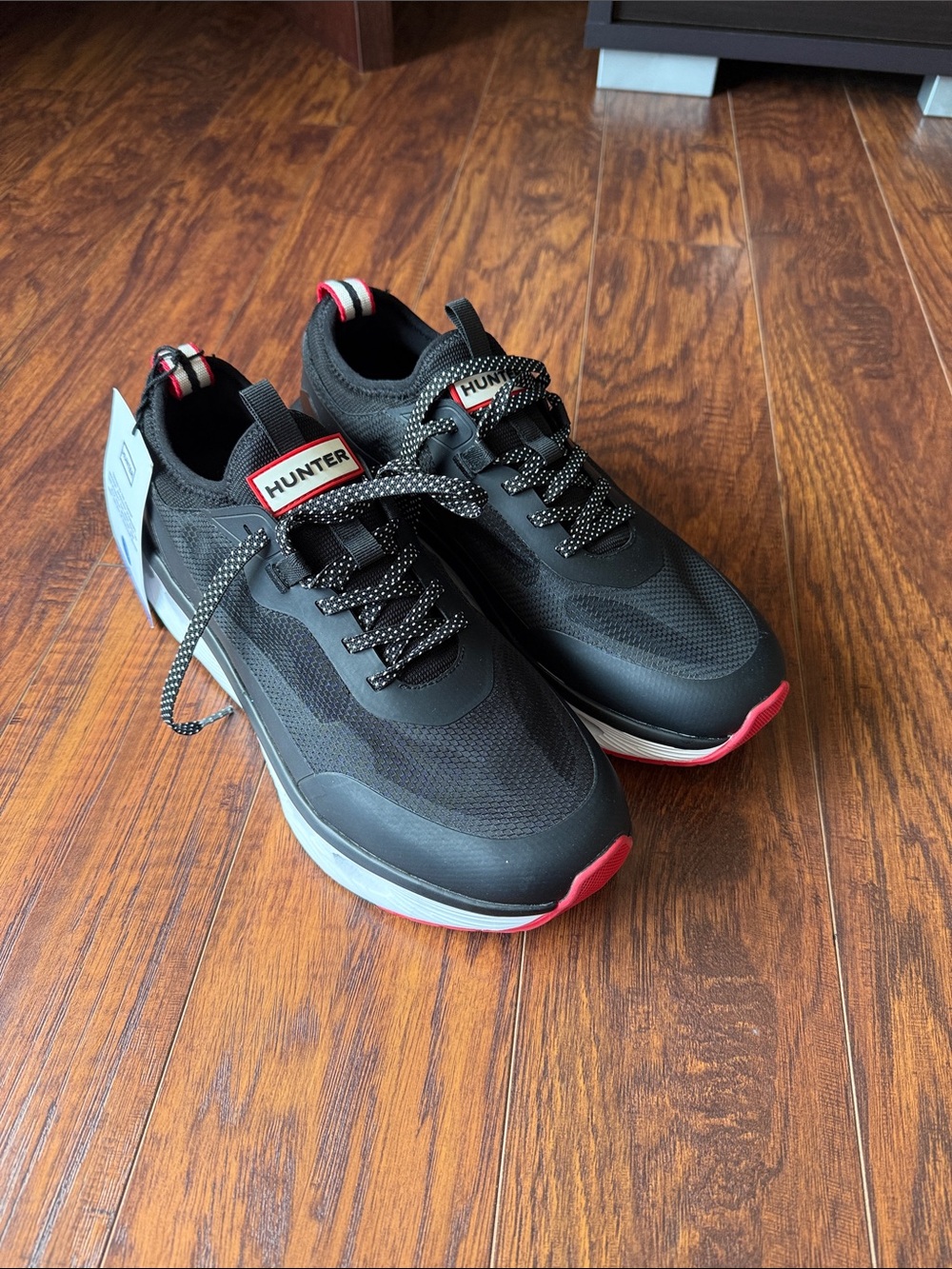 Hunter Wonen’s Black Sneakers with Red Trim
